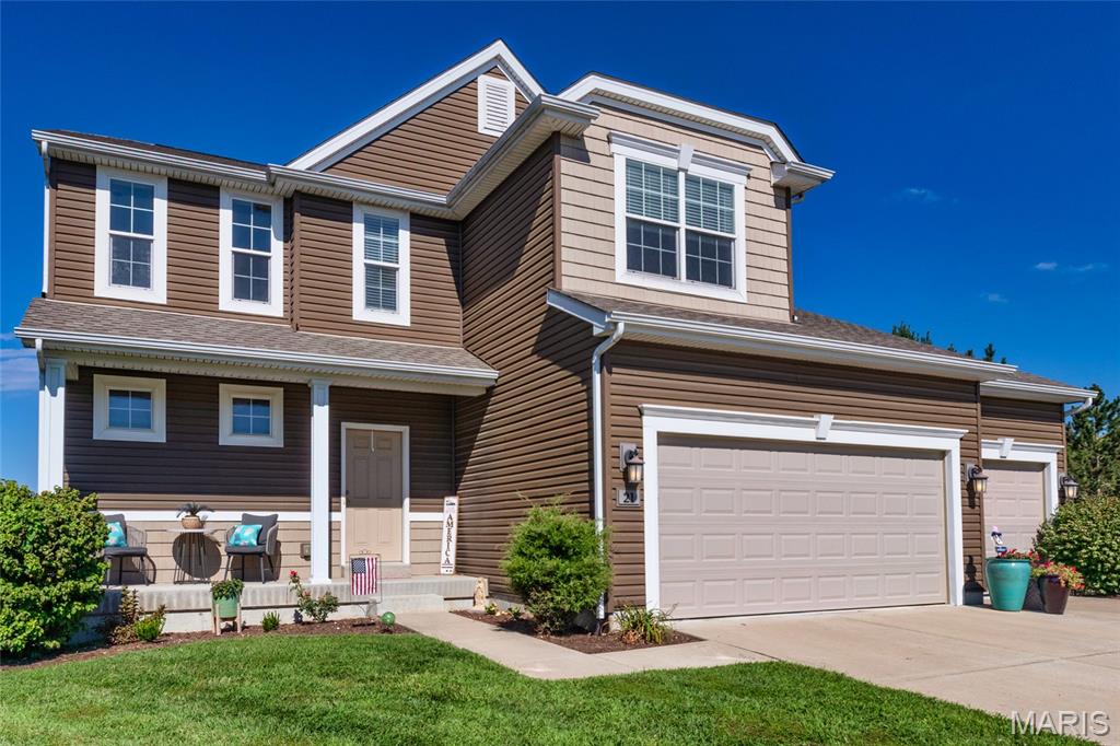Fantastic location at the end of a smaller cul de sac of homes!  9 years young Payne built home with unique design features including a bright window lit entry foyer next to split stair case, 9 ft. main ceilings, open living, kitchen, breakfast room including a focal point 7 X 4 center granite top island.  42 inch wall cabinets and separate pantry offer plenty of storage space.  Open to living area with gas fireplace and flanking windows.  Oversize 3 car garage with 10 ft. ceiling opens to a large mudroom/organization area.  Great for shoes, coats, and things!.  Laminate flooring throughout main level for EZ clean and a spacious half bath with natural light window.  The 17 X 10 composite surface deck with stairs to the yard is sheltered and private with mature yard and common area trees.  Aluminium fenced rear yard is a great area for the Lads and Lasses!  Also, there is a basement walkout below the deck. Basement offers natural light window and door, framed rear wall, plus rough in for future bath.  Area has great potential for finished family room and storage.  Some new carpet and fresh paint has be completed (9/3).  Second floor starts with a bright comfortable landing and the large primary bedroom with walk-in and extra closets.  Extra large primary bath with natural light frosted window, separate soaker tub and shower.  Adult high double bowl vanity sink.  Two exceptional size 2nd and 3rd bedrooms with ceiling lights in both, potential ceiling fans.  Bonus, 2nd floor laundry for EZ laundry. This is a well built flexible space home offering new owners great future potential.  Please come tour while it is available.