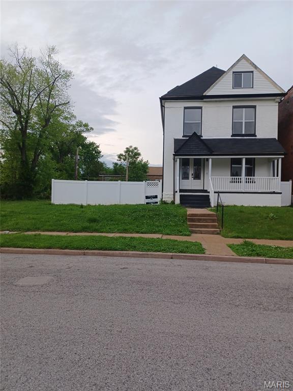 Beautiful renovation in the heart of North St Louis just minutes away from the NGA. Located in the center of millions of dollars in neighborhood revitalization efforts. Home boasts 3 stories of elegance with 5 bedrooms, 3.5 baths. From the exquisite chandelier in the entry foyer, the open concept kitchen and dining area to the stunning light fixtures and ceiling fans throughout, no detail was missed. The kitchen features custom cabinets, a center island, granite countertops, gold waterfall workstation kitchen sink, and new stainless steel smart appliances. All baths include Bluetooth color changing exhaust fans. Main suite spa-like bath with double sink, separate soaking tub, water closet and large glass enclosed shower. Smart Google thermostats and sensors to ensure proper airflow. Google doorbell and cameras. New windows, electric color changing fireplaces, floors, paint, HVAC, roof, deck and more! Vinyl fence around home and attached level lot. Home is all electric. Detached 2 car garage has new roof and paint as well. Home appraised for $395,000 in December of 2025.