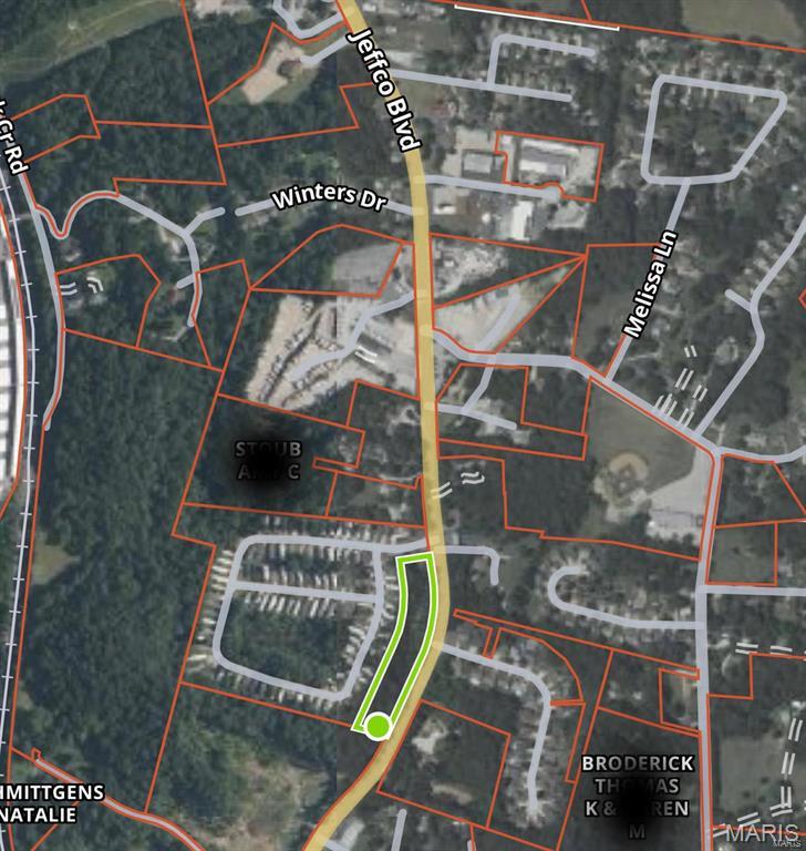Discover 2.84 acres of property, perfectly situated alongside hwy61/67 and backing up to South Woods Mobile Home Park. Zoned as planned mixed residential, this property offers flexibility for both residential and select non-residential development. With its excellent visibility and easy access, this is an outstanding opportunity to create a dynamic living space or community-focused project. Property has LARGE flat area ideal for building.