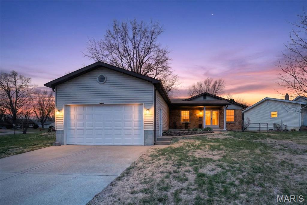 19 Estes Pkwy: A charming and well-maintained ranch-style home offering 3 bedrooms and 1 full bath, all conveniently located on the main level. The spacious kitchen is truly the heart of the home, featuring a large center island, custom cabinetry with a slide-out pantry, a built-in desk area, and an abundance of counter and cabinet space—perfect for everyday living and effortless entertaining. Natural light pours in throughout, creating a warm and inviting atmosphere. The primary bedroom features a lovely bay window, adding character and extra sunlight. The full bath has been tastefully updated and showcases a large standalone shower with dual shower heads and a handheld sprayer. Step outside to enjoy a nicely sized, fenced backyard—ideal for relaxing, entertaining. The generously sized, partially finished basement features a nice sized laundry area and offers endless potential for additional living space, recreation, or storage. Complete with an oversized 2-car attached garage. This home is conveniently located near I-255 and within the Mehlville School District, offering both comfort and convenience. A fantastic opportunity with room to grow! Welcome Home!