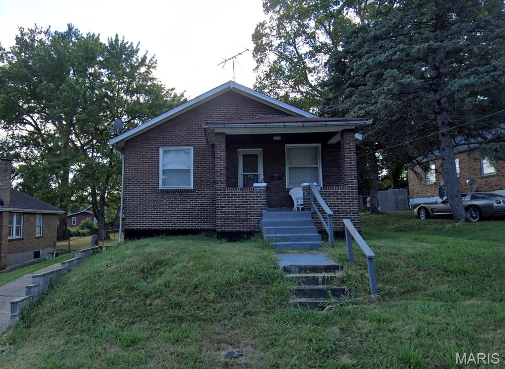 Welcome to your next investment opportunity! This 1 bed 2 bath Bel-Ridge Bungalow is leased at $800/month to a long term tenant in place since 2020. Lease is through December 2026, offering immediate income. The partially finished walkout lower level already features a full bath and offers exciting potential for additional finished living space or a possible bedroom. Just minutes from UMSL with easy access to shopping, dining, and major commuter routes, the location keeps everyday convenience close at hand. This is a perfect addition to your investment portfolio. Inquire today!