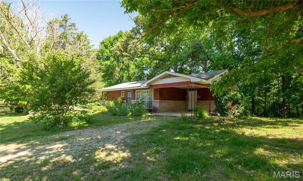 This move-in ready 3 bedroom, 1 bath home sits on 14 wooded acres with space to explore and plenty of room to grow. Enjoy peaceful country living and with Current River just minutes away,  outdoor opportunities abound right in your own backyard. Property also features a 24x24 concrete pad ready for a shop or garage. A great place to call home!