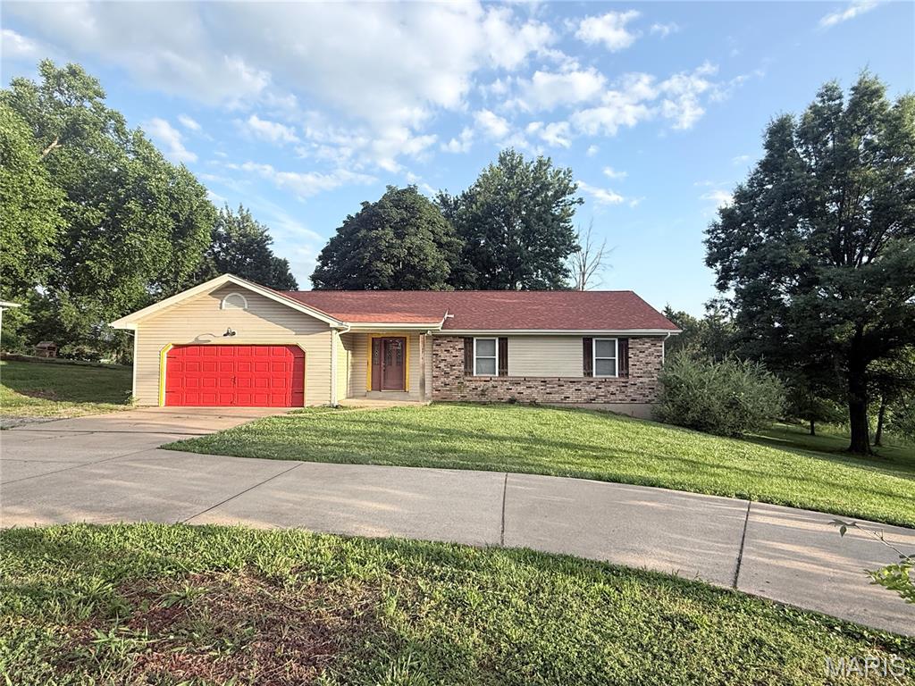 Rare opportunity to own a home you can customize to your tastes on one acre in St. Charles County and the Francis Howell School District, with no HOA!! The home offers 1,552 square feet on the main level, plus roughly 1,200 square feet of finished lower-level living space, providing plenty of room to spread out. This house offers the perfect opportunity for some sweat equity.  The heavy lifting has been done, the roof, water heater, and high efficiency heat pump are all 4 or less years old!  The possibilities are endless with the finished basement with a full kitchen, full bath, and two bedrooms! Mother-in-law quarters? Won't leave the house, kid areas? Come make it what you want!

This property offers the perfect opportunity to live in the home and repair as needed, or make the home perfect before moving in, and put your personal touch on the finishes.  Property is being sold in its current, as-is condition. Seller will make no repairs. Inspections are welcome for the buyer’s information.