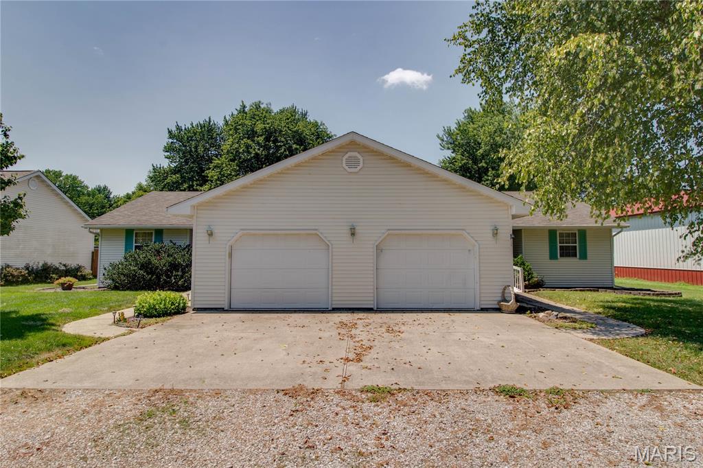 Excellent investment opportunity in a desirable location! This well-maintained duplex features two bed identical units, each offering 2 bedrooms, 1.5 bathrooms, in-unit laundry, and an attached 1-car garage. The open-concept layout provides comfortable living with generously sized bedrooms and ample living space. Each unit also includes a back deck, perfect for relaxing or entertaining. There is even a garden shed with electrical and water! Major mechanical updates have already been completed, with all mechanical systems replaced within the past two years, offering peace of mind for years to come. Conveniently located within walking distance to parks and the school! Whether you're looking to expand your investment portfolio or occupy one side while generating income from the other, this property is a fantastic opportunity!