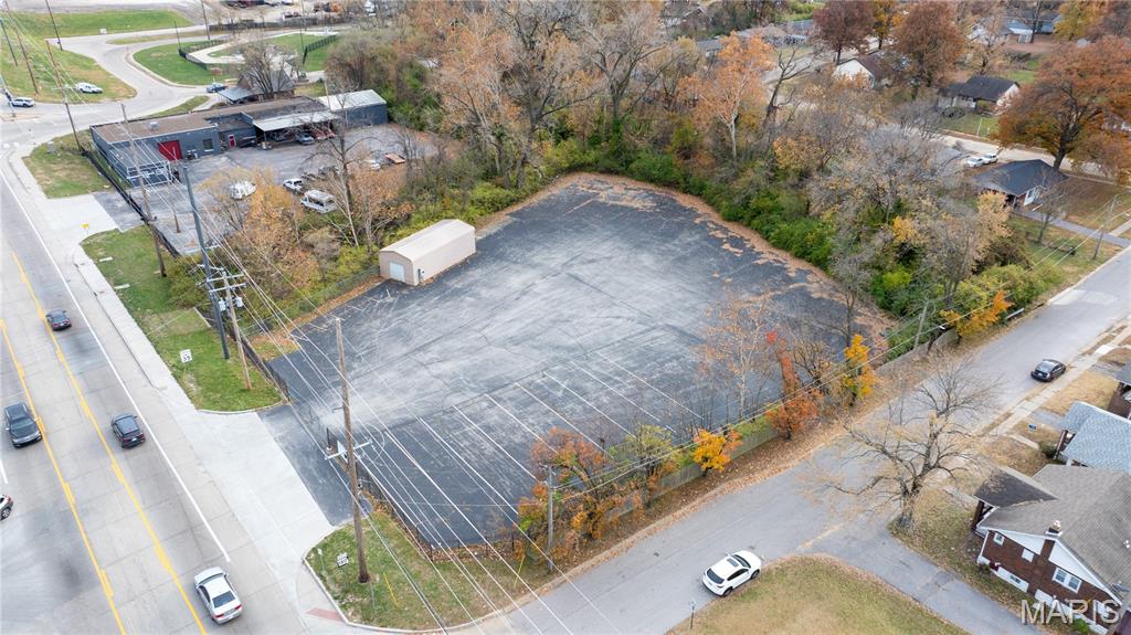EXCEPTIONAL COMMERCIAL LOT OPPORTUNITY!!!  Don’t miss this 1.71-acre commercial lot ideally positioned along the high-traffic business and industrial corridor of St. Charles Rock Road. This private, paved, and gated property is fully equipped with security lighting and a 12’ x 10’ metal shed with electric, making it ready for immediate use.  Previously utilized as a shipping and receiving lot for a car hauling business, the property is well-suited for a wide range of commercial uses, including overnight truck parking, car dealership operations, towing or tow yard services, transportation and logistics, retail, or secure storage.  Enjoy a central St. Louis County location just minutes from Downtown St. Louis, Downtown Clayton, St. Louis Lambert International Airport, I-170, and I-70, providing excellent access and connectivity for employees, customers, and fleet operations.  A rare opportunity for a versatile, commercial site in a highly desirable and accessible location!  Schedule your appointment today!