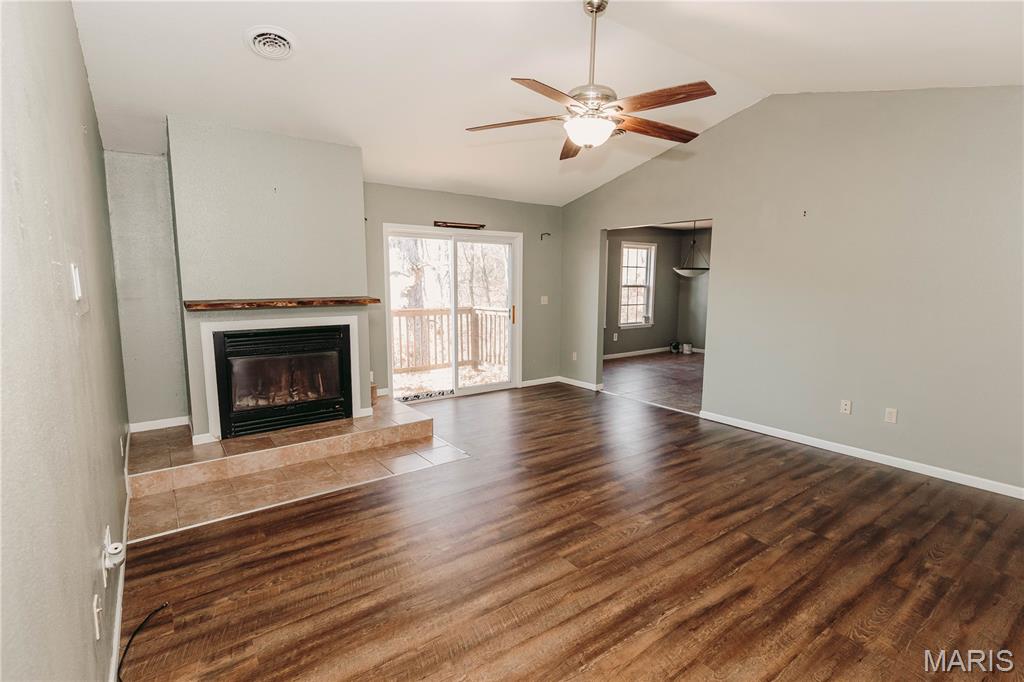 5 Minutes from the Ft. Leonard Wood front Gate! This inviting 3 Bedroom/2 Bathroom home offers spacious living and beautiful views throughout. Inside, you’ll find a  gorgeous Living room featuring Vaulted Ceilings, glass doors overlooking a private wooded back-drop with a beautiful view, a kitchen with a great layout and plenty of cabinetry plus a pantry. Then you will find 3 HUGE bedrooms, and 2 well-appointed bathrooms. The large size of these bedrooms are all a MUST SEE. This Master Bedroom & En Suite is HUGE with a newly renovated walk in shower and 2 large separate Closets! Next there is a large unfinished basement, that provides an incredible opportunity—it is ready for you to finish it to create YOUR perfect space! Anything you can think of: a recreation room, additional bedrooms, home office, gym, or a safe room, walk in Vault, game room tailored to your interests. Additional highlights include a 2-car garage and a private wooded backyard, offering both convenience and natural beauty. NOTE: This home is less than 5 minutes to several different access points to the River close by. This provides endless opportunity for multiple interests like fishing, camping, boating, hiking, nature enthusiasts, wildlife photography! This is a home with comfort today and endless possibilities for tomorrow. Let your vision make it truly your own!