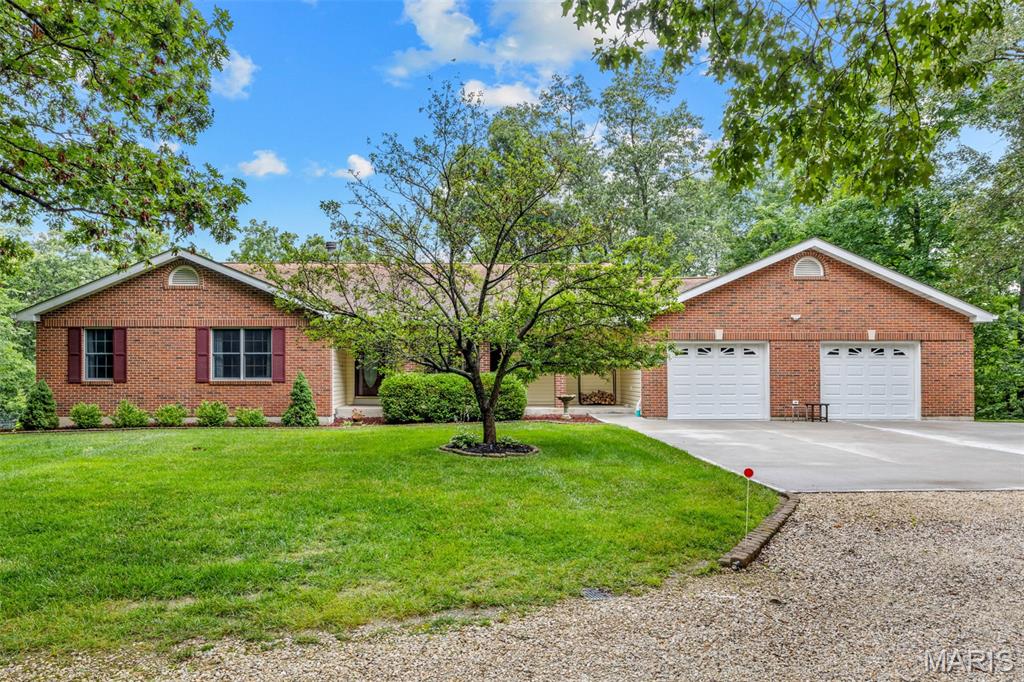 If your looking for a custom ranch home tucked into 3 acres surrounded by nature and a park like setting then look no further!!!! This isn’t your standard boring home on a huge lot with tons of grass to mow, this one was masterfully planned to be built within the property surrounded by nature and trees. Home features include 24x24 detached workshop with separate 200 amp service and lean-2 for extra storage, In ground swimming pool with pavilion and entertaining space, outdoor fire pit, deck that stretches the entire back of home with 3 door accesses and lawn irrigation. Inside you’ll find 3 beds 3 baths, 10 foot master bay window, huge walk in closet and master bath, extra large walk in showers, updated kitchen, extra large 1st floor laundry with room for storage and extra fridge, 400 amp panel main house, ground source HVAC, 3/4 oak floors, bay window in living room, large walk in showers in 2 baths, 9 foot basement pour, newer concrete apron to garage, TONS OF KITCHEN CABINETS AND STORAGE, wood burning see through fireplace, covered front porch, finished basement rec area….. The list simply goes on and on, the current owners built the property to their specifications and truly pride of ownership shows!