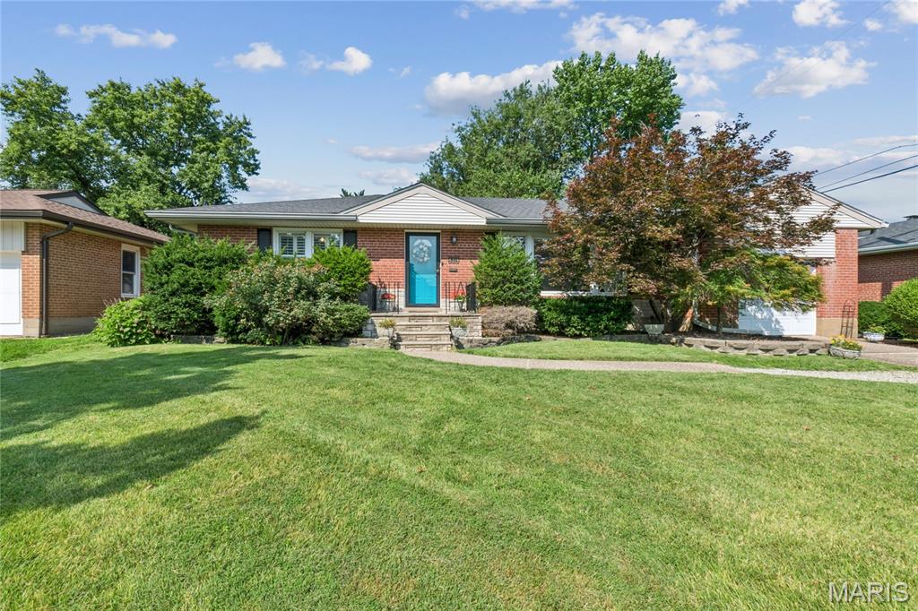 Exceptional onal opportunity to call this enchanting 1950's brick ranch your new home in the neighborly community of Villanova! The curb appeal will draw you right in, greeted by an inviting floor plan with open, naturally lit living space, stunning hardwood floors, and a cozy gas fireplace to chase the winter blues away! The well-designed kitchen with custom 42" granite-topped cabinetry, tile backsplash, and stainless appliances provides room for guests to connect, sip & chat in the adjacent dining and family rooms. There are two tranquil bedrooms with ample closet space and a tastefully renovated bath with a jetted tub to soak your cares away! The cozy family room leads to plenty of room out back to relax on the patio, garden, and roam in the fully fenced backyard. The lower level has plenty of storage space, a laundry area, and the opportunity to create additional living space. Renovations and updates include the remodeled kitchen & bath, newer roof - 2021, water heater - 2026, HVAC - 2016, and more! Easy commute to all the recreational and cultural events the city has to offer, plus shopping and services within walking distance.