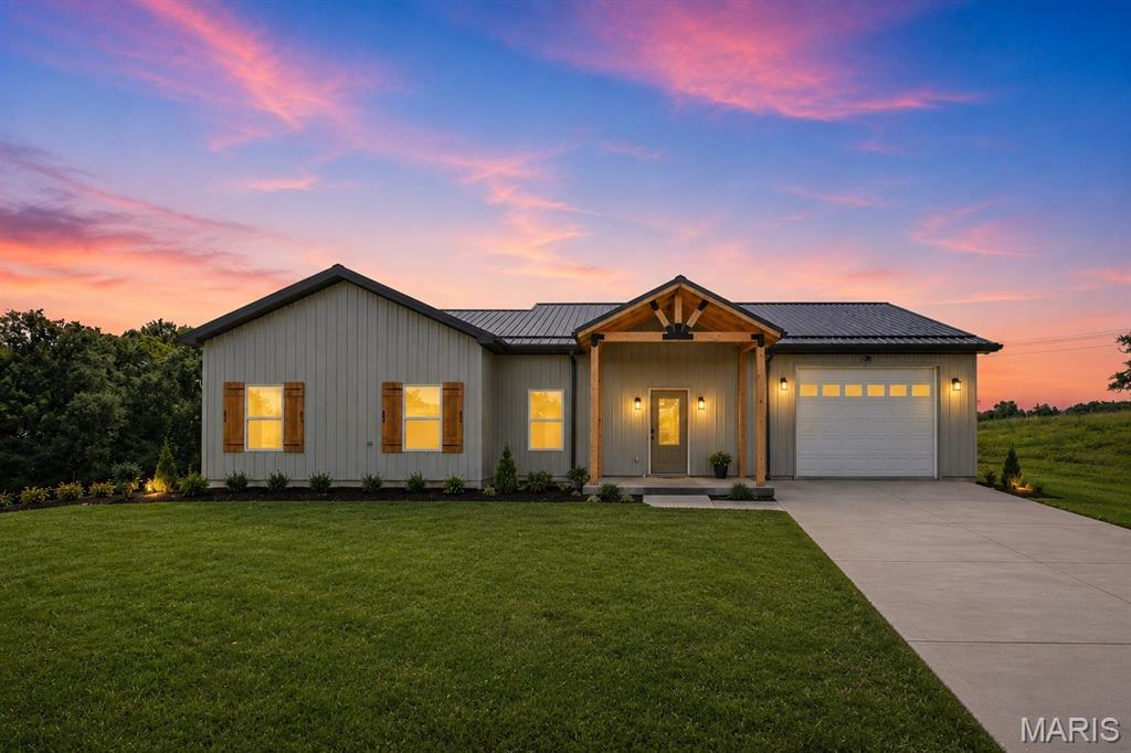 Lake Days Start Here. Dreaming of a brand-new lake getaway with room to breathe? This to-be-built shouse near Mark Twain Lake delivers the perfect mix of modern comfort and laid-back cabin vibes — all on 5 private acres with less than a mile of gravel.
Inside you’ll find 1,187 sq ft of smartly designed living space featuring:
• 2 bedrooms
• 2 full baths
• Dedicated laundry room
• Open-concept living/kitchen area with all-electric appliances

Need space for the boat, side-by-side, or extra guests? The 600 sq ft combo garage/finished flex space gives you room for storage, hobbies, or additional hangout space. 15 minutes to Perry, 15 minutes to Paris, 15 minutes to South Fork Boat Ramp. Whether it’s early mornings on the water, evenings around the firepit, or quiet weekends away from the noise — this property checks every box. ** More lots available**