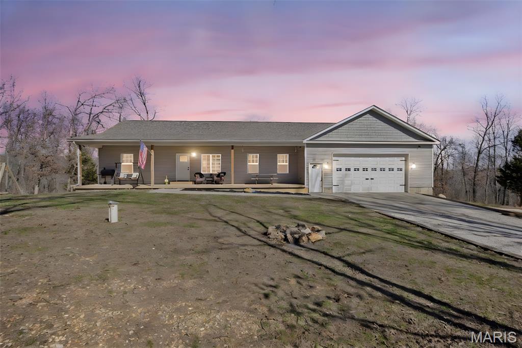 Beautiful newer home on 15 surveyed acres in Washington County, located just one hour south of St. Louis! This 3-bedroom, 2-bath home is only 3 years old and has been exceptionally well maintained.
Step inside to an inviting open living space featuring vaulted ceilings and a stunning kitchen complete with butcher block countertops, farmhouse sink, and plenty of workspace. Just off the kitchen, you’ll find a large deck overlooking the property with breathtaking views—perfect for relaxing or entertaining.
The spacious master suite offers a true retreat with a custom walk-in tile shower, large soaking tub, and walk-in closet. The home also features a full walk-out basement with 9-foot walls, flooring installed throughout most of the space, and built-in shelving for ample storage—ready for additional finishing if desired.
Outside, the property offers a 2-car oversized garage with a workbench, a custom-built chicken coop, and a spring located on the southeast corner of the acreage. Whether you’re looking for peaceful country living, a hobby farm setup, or simply room to roam, this property checks all the boxes.
Don’t miss this opportunity to own a beautiful home with acreage.