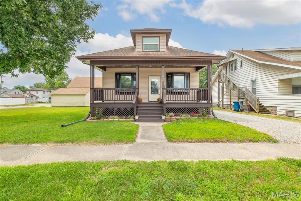 Welcome home to 640 E. Ferguson Ave.!
This spacious home has been recently remodeled and offers 3 bedrooms and 1.5 baths in the heart of Wood River. Walk in the front door to an open living room/dining room combo with luxury vinyl plank flooring that flows into the kitchen. The completely renovated kitchen has an abundance of natural light that showcases the fresh white cabinets, new counter/sink, stainless dishwasher and microwave. Off the kitchen is an enclosed back porch with a new exterior door that leads out to a beautiful deck for grilling and chilling!!. Two freshly carpeted bedrooms and a renovated bathroom with gray LVP finish off the main level. Upstairs, you will find a large freshly carpeted bedroom space, a nice open closet and a half bath. This home also has a freshly graveled driveway with ample parking, pull through driveway, extra rear parking area and a nice side/backyard perfect for a playset or for our four legged friends!  The unfinished basement offers a potential workshop area and plenty of storage. Close to downtown Wood River and within walking distance to Lewis and Clark Elementary/Jr. High School and the library!  This home is move-in ready and awaiting new owners!  Home being sold as-is and buyer will be responsible for city occupancy.