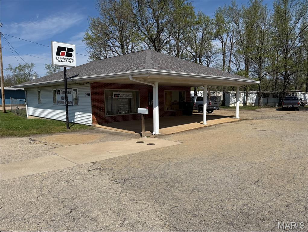Prime commercial opportunity in a high traffic location! This well maintained building offers excellent visibility, easy access, and ample on site parking for customers and staff. Currently operating as an Insurance agency, the flexible layout is ideal for a variety of business uses including retail, office, medical, or service based operations. A Fantastic investment with endless potential!