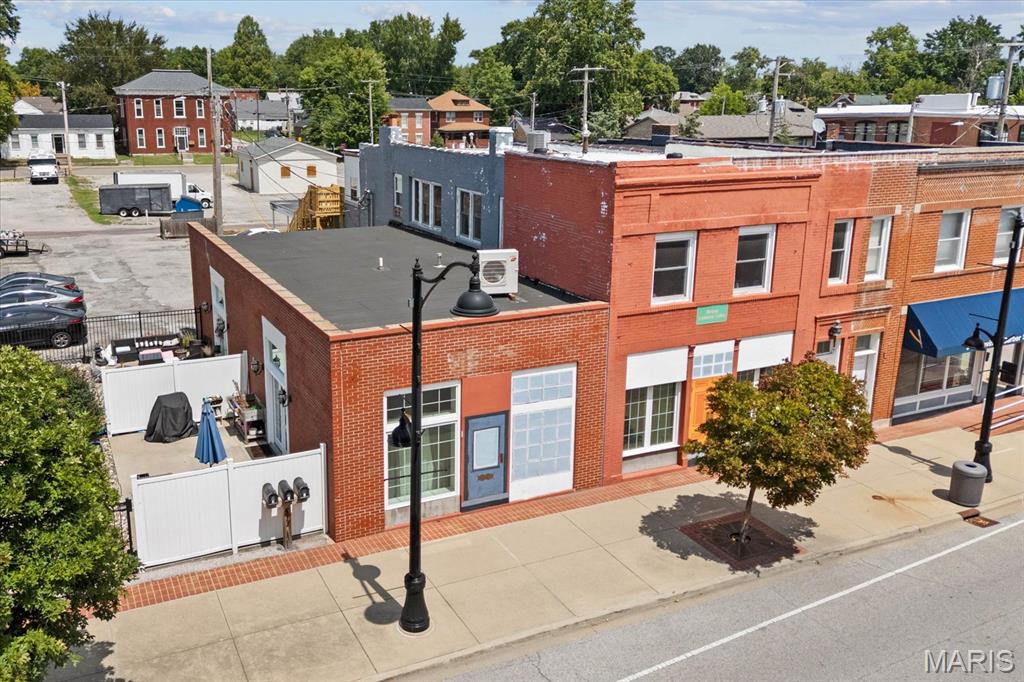 Here is your opportunity to purchase 4 fabulous income generating lofts under one roof in downtown Belleville.  The Brass Lantern Lofts is a wonderful 1872 building that was brought back to life in 2019 with extensive work done to the main floor including all new electrical, plumbing, walls, HVAC, and the list goes on.  Three units are on the ground floor, two of them are two bed two bath, and are approximately 1300 square feet.  The two bedroom units each have their own courtyards.  The other first floor unit is a one bed one bath and is approximately 900 square feet.  The upper level was updated nicely and had new HVAC installed in 2022 along with a new deck and back stairs last year.  The upper unit is a 3 bedroom one bath and is approximately 1600 square feet.  All units have stainless steel appliances and washer and dryer hookups. Owner pays water, sewer, and trash for the ground floor units. The upper unit pays their own water and sewer bill. Each loft gets two parking spaces, there are 18 spaces so that leaves 5 spaces to rent for additional income.  These units will only appreciate in value and there are only so many lofts/apartments in the downtown area.  This area of Belleville has become more desirable as time has gone on.  Pre-approval of proof of funds required to view this property.  All information to be verified by buyer and buyer's agent.