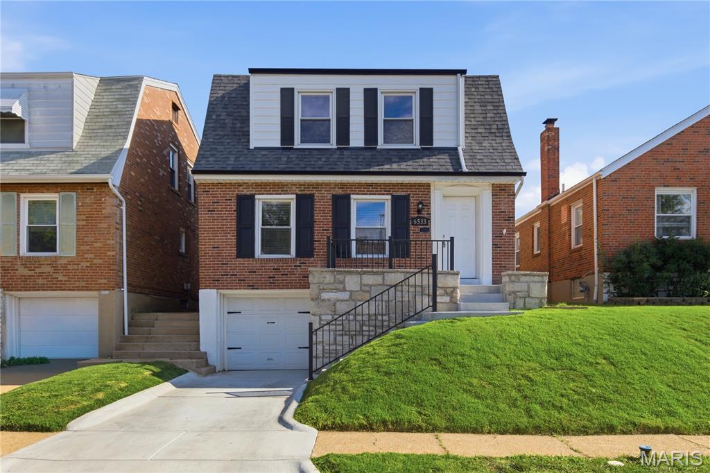 GREAT HOUSE!!! This is your chance to own a classic 1937 Lindenwood Park charmer with the kind of character people love in South City. Set up nicely from the street, the stone front porch gives the home great curb appeal and the perfect spot to enjoy morning coffee or late night talks. Step inside and you’ll find beautiful hardwood floors, arched openings, original charm, and a warm, inviting layout that just feels like home. The kitchen offers stainless steel appliances and great functionality, while the back bonus room with brand new luxury vinyl flooring gives you tons of flexibility as a home office, additional sleeping area, playroom, movie room, or whatever fits your lifestyle. The dining room is ready for family dinners, holidays, and hosting friends. Upstairs you’ll find three spacious bedrooms with great natural light. Out back, the patio and deck space create an awesome setup for grilling, entertaining, or relaxing in the yard, plus the brand new driveway and rare ATTACHED GARAGE are HUGE bonuses for the area. The finished basement includes a sump pump for added peace of mind, as well as a FULL BATHROOM. All of this just minutes from Lindenwood Park, Pint Size Bakery, Blueprint Coffee, Ted Drewes, and an easy stroll down to neighborhood dinner spots like Pietro’s or Trattoria Marcella. DON’T MISS YOUR OPPORTUNITY!!! SCHEDULE A SHOWING TODAY!!!