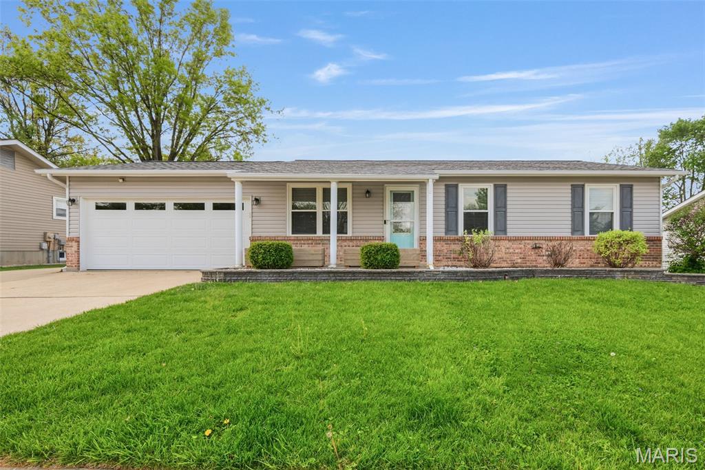Welcome home to this tastefully updated ranch in the heart of St. Peters! Pride of ownership shines throughout this well-maintained and beautifully modernized home. The completely renovated kitchen is the true centerpiece, featuring 42” custom cabinetry, Quartz countertops, tile backsplash, stainless steel appliances, and a huge center island with stylish pendant lighting — perfect for everyday living and entertaining. All bathrooms have been thoughtfully updated, and newer luxury vinyl plank flooring flows seamlessly throughout the main level. A custom staircase leads to the partially finished lower level, offering a third full bath and a possible fourth sleeping area, just awaiting your finishing touches to add even more living space. Major updates include new roof, siding, gutters, newer windows and garage door for added peace of mind. Outside, you’ll love the professional landscaping, extended 3-car driveway for extra parking, service door to the garage, and a level fenced backyard with patio — ideal for gatherings and relaxing evenings. Schedule your private showing today — this one won’t last!