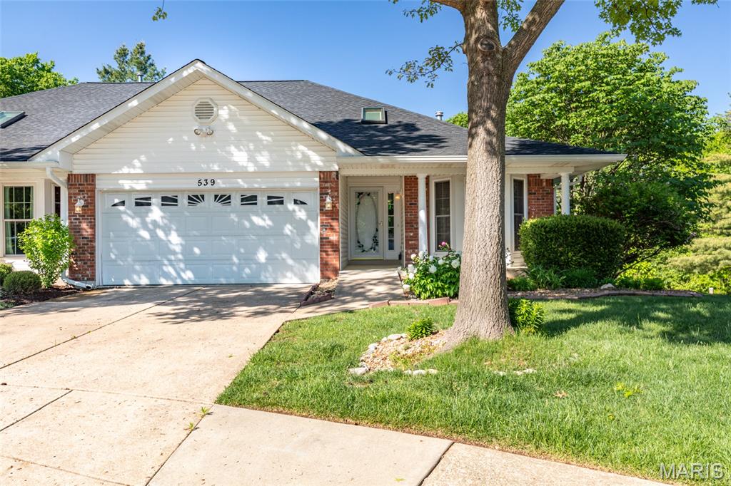 Back on market during inspection period at no fault of the seller. Open house Sunday, June 14 from 12-2.

Welcome home to this beautifully updated 3-bedroom, 3-bath villa — freshly painted and move-in ready with brand-new carpet (April 2026) throughout.

The heart of the home is a stunning great room with soaring vaulted ceilings, rich hardwood floors, a cozy gas fireplace, and a wall of windows that floods the space with natural light. Step through to the three-season room and take in serene, private views of the surrounding woods — the perfect spot for morning coffee or evening relaxation.

The kitchen is thoughtfully appointed with electric range, built-in microwave, dishwasher, and a refrigerator with ice maker — everything you need right at your fingertips. Convenient main-floor laundry and an attached 2-car garage round out the practical touches that make everyday living effortless.

The primary suite is a true retreat, featuring a graceful bay window, ceiling fan, a step-in soaking tub, and an expansive walk-in closet. A second main floor bedroom offers its own bay window, new carpet, and ceiling fan — bright and welcoming. The hall bath adds a luxurious touch with a jetted tub.

Downstairs, the mostly finished basement expands your living space dramatically. A generous family room walks out to a private patio with breathtaking wooded views — ideal for entertaining or simply unwinding. A third bedroom, third full bath, additional walk-in closet, and ample unfinished storage complete this incredible lower level.

Spacious, light-filled, and surrounded by nature — this villa truly has it all.