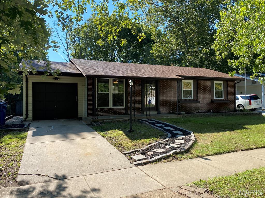 This stunning professionally rehabbed home is on a large lot in the heart of Florissant. From the chef inspired kitchen and open living space with 3 bedrooms, to the large backyard oasis, there is plenty of room for everyone to enjoy. Spacious finished basement with bonus living room, lots of room for storage, and movie room with built-ins for a big screen. Recent updates include new and refinished hardwood floors, new carpet in the basement, kitchen with stainless appliance package along with new counter tops and cabinets, and all new paint throughout. Huge 2 car tandem parking in garage. Pets require approval and additional fees. Situated in a family friendly neighborhood on a quiet tree-lined street, this home is sure to lease fast!