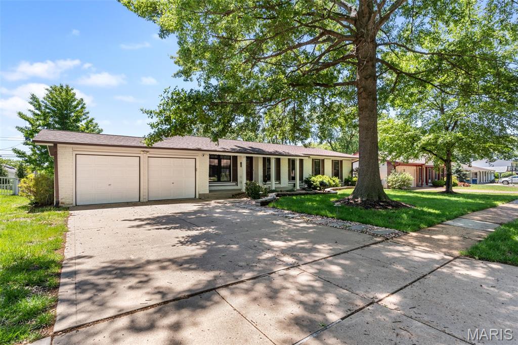 OPEN, BRIGHT & BEAUTIFULLY RENOVATED! Sprawling 5BR/3BA ranch in Old Farm Estates boasts 3,315+ sqft of finished space, including an awesome walk-out basement (2024). Chef's kitchen features cherry cabinets with new cabinet hardware, quartz counters, SS appliances & custom coffee nook. New light & bright LVP flooring spans the main level. Enjoy remodeled master baths (2024), gas fireplace, crown molding & skylight.
TOTAL PEACE OF MIND MECHANICALS: Main sewer & laundry lines completely replaced (2024) with brand-new PVC plumbing by a certified plumber, done to code! No cast-iron worries!
Exterior highlights: composite deck overlooking a manicured yard, spectacular brick patio/steps, and a storage shed with electricity. Heavy-hitter updates included in 2021: Architectural Roof (2021), new thermal windows/sliding doors, updated electric panel, insulated garage doors/opener, Epoxy garage floor, updated concrete, and extra attic insulation. Pristine high-end finishes throughout—must see in person!