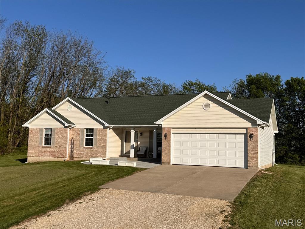 SELLER MOTIVATED FOR QUICK SALE DUE TO A RELOCATION. PRICE REDUCED!
Lovely home sitting on 10.9 acres in sought-after private country subdivision and just a short distance off of scenic Hwy D in PIke County.  Enjoy a beautiful panoramic view from your front porch and privacy in backyard backed by trees. Plenty of room for detached shop, man cave, she-sheds, play area, pool, and pets!  3/4 ACRE pond built a couple years ago. Inside enjoy modern open floor plan with vaulted ceiling and nice lighting. Full, unfinished basement (with walk-up access from garage in addition to interior) just waiting for your choices! Newer roof (7 years) New heat/air (1 year) New kitchen stove/oven. This is a great one!
