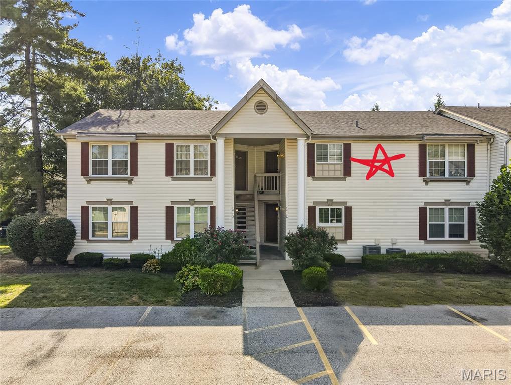 On-trend and meticulously maintained condo in a fantastic St. Peters location!  Located just minutes from the Page Extension (Hwy 364), this condo offers easy access to Highways 94, 364 and 40-61.  This 2 bedroom, 2 bath top floor condo has a deck (new in 2026), sits on a non-through street, has views of an adjacent tree line, and is a short walk to the neighborhood pool. The floor plan is open and spacious and the décor is neutral and tasteful.  Features include luxury plank flooring in the Entry-Living Room-Hallway, ceramic tile in the Kitchen and Bathrooms, granite countertops, tile backsplash, stainless steel appliances, smooth top stove, refrigerator, pantry, stainless steel range hood, 6 panel doors, a large sliding door from the Living Room to the deck, walk in closet and bypass closet in the Primary Bedroom (2 closets), Eco thermostat, vanities with dressing table, ample counter space, tub/showers in both bathrooms and more.  This is an all-electric home with in-home laundry and the washer and dryer are included.  A monthly fee includes use of the community pool, water, sewer, trash, grounds maintenance, snow removal, exterior maintenance (excluding decks) and more per Indentures.  There are two assigned parking spaces directly in front of the condo, and there is guest parking directly across the street. Students will attend desirable Francis Howell schools.  Great location, spacious rooms and a community pool. All furnishings are negotiable. A must see, check it out!