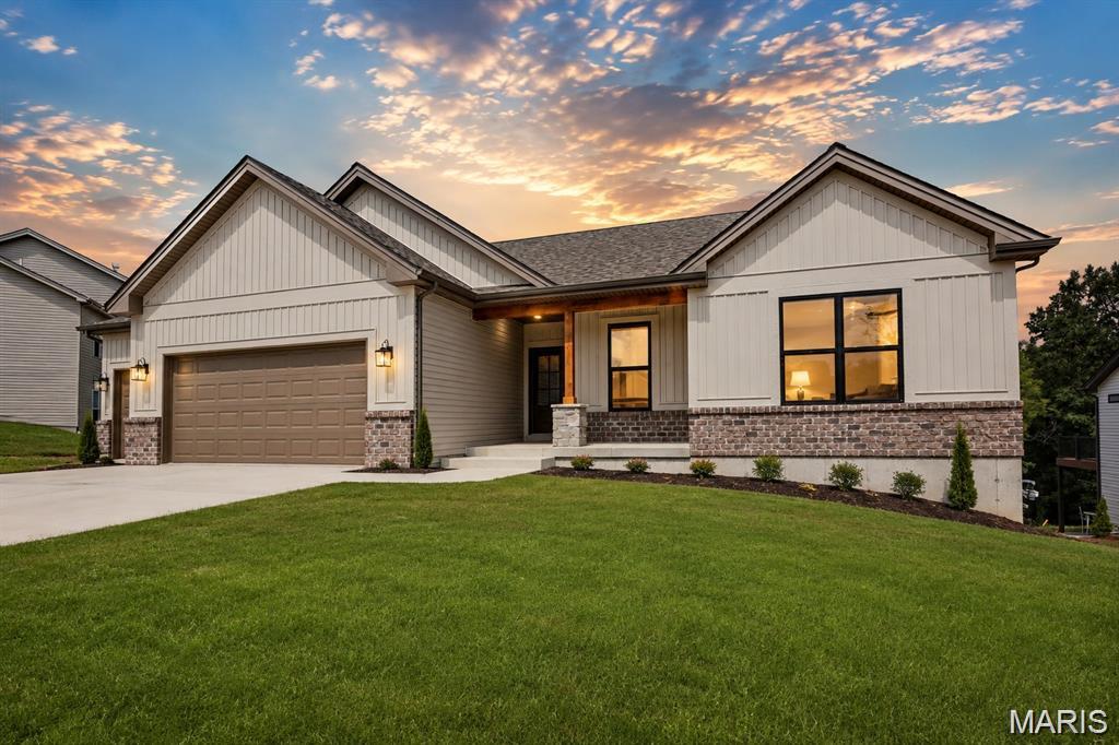 Welcome to the Oxford by Northern Star Homes - a thoughtfully designed 3-bedroom, 2-bath ranch offering the space, style and privacy. Located in Stone Bridge in Washington, Missouri, this new-construction home features an open-concept layout, soaring ceilings and abundant natural light. The designer kitchen showcases quartz countertops, a large center island, stainless-steel appliances, ample cabinetry and a walk-in pantry, opening seamlessly to the dining and living areas. Gather around the statement fireplace or step outside to the covered deck overlooking a peaceful, tree-lined backyard. The private primary suite includes a spacious walk-in closet and a luxury bath with dual vanities and an oversized walk-in shower. Two additional bedrooms provide flexibility for guests, children or a home office. Additional highlights include upgraded flooring, main-floor laundry, energy-efficient construction, generous storage and a hard-to-find three-car garage. The walk-out lower level offers excellent potential for future living space. Enjoy a modern, low-maintenance home near Washington’s parks, trails, shopping, dining and riverfront. 

Enjoy your private backyard in an ideal WashMO location - Stone Bridge, by Northern Star Homes
Northern Star Homes - Washington’s hometown builder.