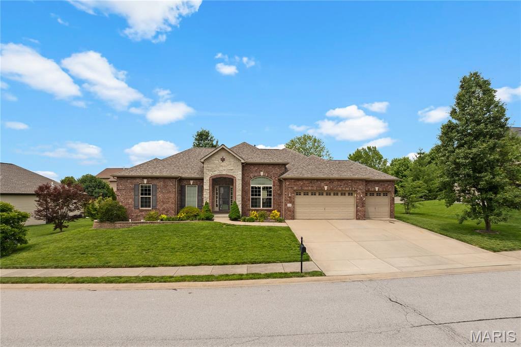 Welcome home to this meticulously maintained, spacious ranch in the popular Maple Hill subdivision. This home has 4 bedrooms, 3 bathrooms and a open layout that makes it feel bright and inviting. There’s a cozy gas fireplace and most of the main level has beautiful hardwood floors. The kitchen is a standout with granite countertops, custom cabinets and breakfast bar. There is also a pantry and stainless appliances, including a double oven—perfect for cooking and hosting. The separate dining area is great for gathering with family and friends. The split bedroom layout gives guests their own space while the primary suite is a true retreat, complete with tray ceilings, custom walk-in closet and spacious master bath. Enter outside and enjoy the screened-in porch with built-in shades, plus a patio and privacy fence. The basement is partially finished with a family room, bar, second primary suite, full bath and a huge storage space with built-in wood shelving. The amenities continue with an oversized 3-car garage, complete with a work bench and overhead custom built storage, a laundry room with built-in cabinetry and utility sink, and a security and sprinkler system. This must see home checks all the boxes! (Note:  Seller has requested a closing date after July 31, 2026.)