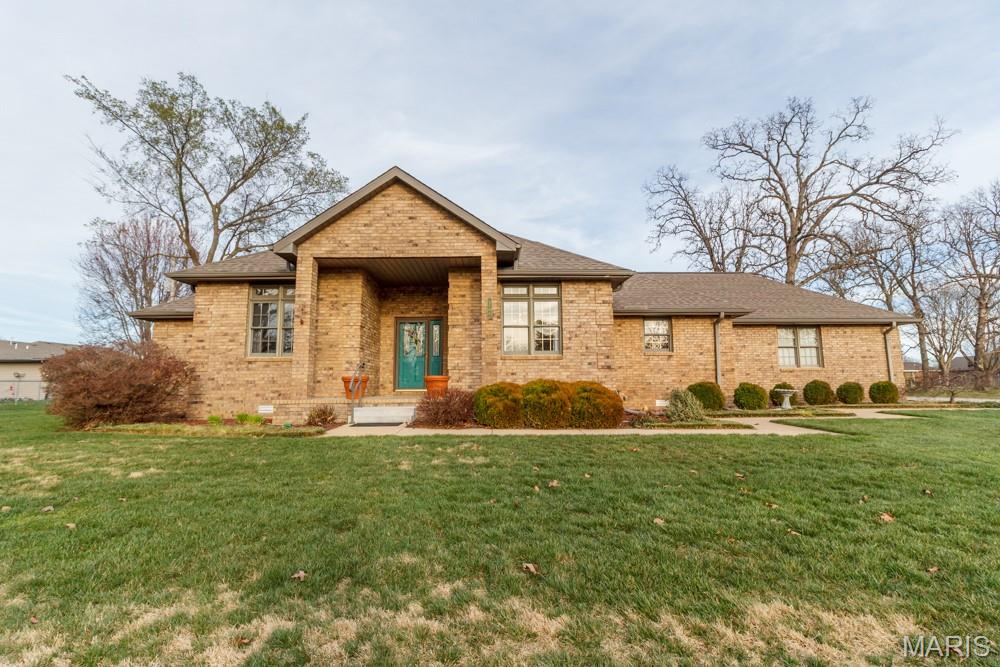 YOU MAY HAVE MISSED OUT ON THIS ONE THE FIRST TIME.......IT'S AVAILABLE  NOW !!  
 
LOCATION  LOCATION.... THIS ALL BRICK HOME SITUATED ON A CORNER LOT with 1954 sq ft of living space,  THIS  WELL CARED FOR HOME HAS 3 BEDROOMS, 2 FULL BATHS,  NO CARPET  ..... IT HAS ALL. HARDWOOD and Ceramic TILE FLOORING.  This Home offers LIVING ROOM  with access to the  LARGE COVERED REAR DECK.  SPLIT BEDROOM PLAN THE  MASTER BEDROOM -BATH SUITE  has  your DOUBLE VANITY,  A JETTED TUB,  WALK IN SHOWER, WALK IN CLOSET. ACCESS TO THE REAR COVERED DECK.  ALL BEDROOMS HAVE HARDWOOD FLOORING.  THE KITCHEN HAS A LOT OF CABINETRY, STAINLESS APPLIANCES,  HANDY LAUNDRY ROOM, SEPARATE or  FORMAL DINING ROOM, COVERED FRONT PORCH and REAR DECK, CHAIN LINK FENCED YARD, A BRICK STORAGE BUILDING.  2 CAR ATTACHED GARAGE.  
***NEW SHINGLES IN 2020.*** NEWER HVAC SYSTEM 2022
       MAKE YOUR APPOINTMENT TODAY !!