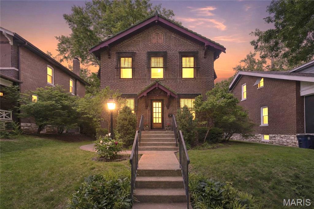 Classic U City family home, this appealing 3 bedroom is all ready for new owners. The spacious living room with handsome gas fireplace and separate dining room are perfect for entertaining. The new kitchen is so delightful with all white appliances, new cherry wood cabinets, new quartz counter tops and a marble mosaic back splash. The new Forno gas stove is vented to the outside. The stairs up can be accessed from the both the kitchen and the living room. Upstairs the main bedroom has a walk in closet, and all three bedrooms have custom closets. There is a medicine closet as well as a linen closet in the hall, the bathroom has been updated and is generously proportioned. The full basement has lots of storage space and a full bathroom. With fresh paint throughout and natural wood floors, you'll be placing your furniture before you leave! A large 2 car garage has extra storage space and a pull down ladder leading to the garage attic, floored and perfect for storage.  All windows in the garage are operational. Garage will be totally empty prior to closing. New AC (2026), new roof and gutters on home (2020), new roof and gutters on garage (2026). All appliances including washer and dryer stay. Great Location, this home is two blocks from the Danforth Campus and metro link, walk to the loop, shopping restaurants and more! This is a winner!