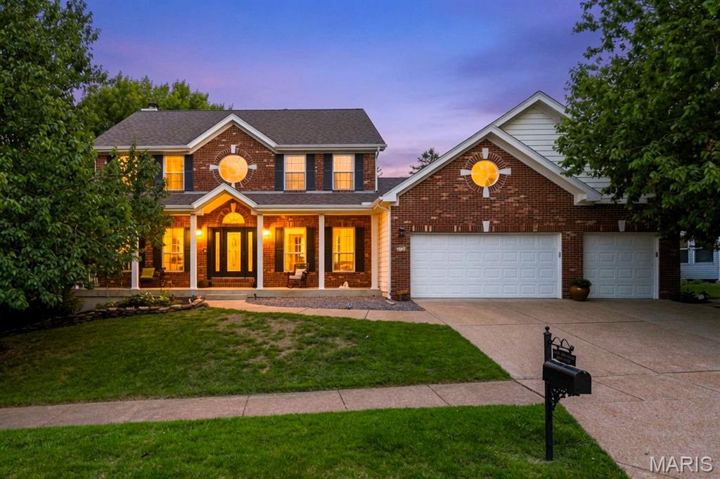 Beautiful 2 Story Oakville home of 5 Bedrooms, 4 Bathrooms with almost 4400 total sq feet and 3 car oversized garage sits on a .39 park-like lot in desired Christopher Oaks.  Stunning elevation of brick and stone welcome you with the large covered front porch and full opaque glass door with full glass sidelites.  The 2 story foyer with T-staircase is flanked by the formal dining and office/study that offers built-in bookcases.  Open floor plan with lovely solid hardwood floors opens to the spacious great room which features floor to ceiling brick gas FP, built-in bookcases, dry bar area and views of large level professionally landscaped yard backing to trees.  Chef's kitchen is open to great room which makes for greater family connections and ease in entertaining.  The kitchen boasts lots of custom cabinetry, granite counters, SS appliances, electric cooktop, HUGE walk-in pantry, large island and nice size breakfast room.  Off of breakfast room is the Sunroom which has tall vaulted ceilings and easy access to the exterior deck area.  Spacious laundry room with sink and 1/2 bath complete the main floor.  UL has primary bed with 2 walk-in closets and luxury bath w/double vanity & separate tub/shower.  3 spacious beds & updated hall bath are also on the 2nd floor.  Walk-out Lower Level offers expansive family rec area with 2nd stone gas FP, beautiful wet bar w/refrigerator, 5th bedroom, 3rd full bathroom and lots of storage.  Exceptional features include - NEW ROOF, oversized 3 car garage, large patio from w/o lower level, high efficiency zoned heating/cooling, alarm system, professionally landscaped yard.  Conveniently located near medical, schools, restaurants, shopping, entertainment.  Seller is offering a 1 year Home Warranty for extra piece of mind.  Seller will also provide pass occupancy with St. Louis County.  Don't miss your opportunity to enjoy all that this exquisite home has to offer.
