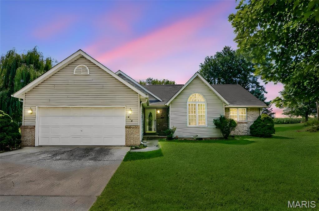 Located in a quiet, established Jerseyville neighborhood, this home blends classic character with contemporary convenience. Inside, you’ll find a light-filled living room with tasteful finishes, an updated kitchen with ample cabinet and counter space, and a flexible floor plan that accommodates family life or remote work. Three comfortable bedrooms and 2 full baths provide practical everyday living, while the private, spacious backyard and 2 car garage complete the package. Close to schools, local shops, and parks — move-in ready and waiting.