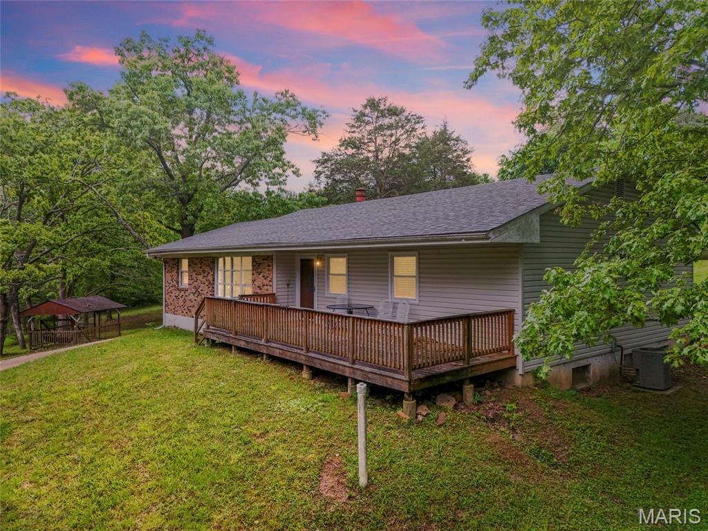 Welcome home to your own slice of country paradise! Nestled on 4 beautiful acres with a peaceful pond, this three bedroom, two bath ranch- style home offers endless potential and the freedom of no HOA restrictions. Whether you're dreaming of a hobby farm, outdoor entertaining, or simply enjoying the privacy and space, this property is full of opportunity. The home is ready for a buyer with vision to come in and add their own finishing touches to truly make it shine. With useable acreage, serene views, and room to grow, this is the perfect chance to create the lifestyle you've been looking for.