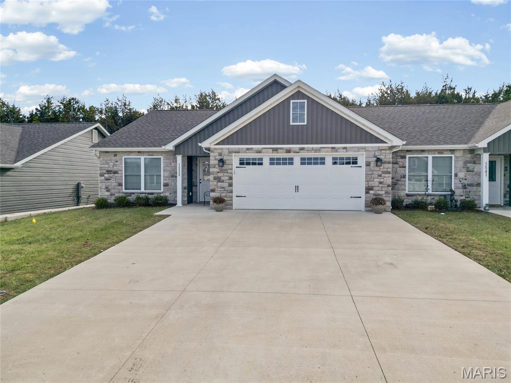Welcome home to 1539 Hickory Landing, a beautiful ranch-style Villa built in 2024. This 3-bedroom, 2-bath home features a desirable open floor plan with stylish quartz countertops and a large center island perfect for entertaining. The living room is highlighted by a cozy gas fireplace, creating a warm and inviting space. You’ll love the abundance of storage throughout the home and the convenience of one-level living. Step outside to enjoy the covered patio with a level, partially fenced backyard! Modern finishes, functional layout, and move-in ready convenience make this home a must see! Showings start 12-10-25.