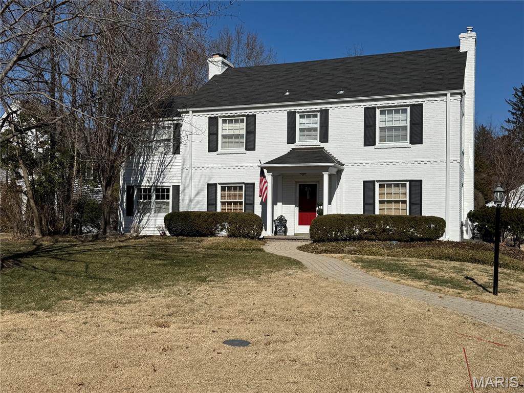 Charming and thoughtfully updated, this 3-bedroom, 2 full 2 half-bath residence offers over 2,400 square feet of beautifully finished living space in the heart of Ladue. The main level features a gracious separate dining room with beautiful crown molding and living room with custom built-ins, and gas fireplace along with a sun-filled office wrapped in windows—perfect for working from home. The updated kitchen boasts new countertops, modern appliances, and an inviting layout ideal for everyday living and entertaining. The upper level includes a spacious primary suite with an expansive, professionally organized walk-in closet and 2 addtional closets a newly renovated bath with shower and double vanity plus two additional bedrooms and an updated full bath. The lower level offers a comfortable recreation area, half bath, laundry, and abundant storage. Outside, enjoy professionally landscaped grounds with an irrigation system, a fenced backyard, manicured lawn, patio, and a two-car detached garage with an additional parking pad. Ideally located within walking distance to Conway school, ladue middle school and Ladue high school as well as nearby shops and restaurants. A true must-see in one of Ladue’s most desirable locations.
