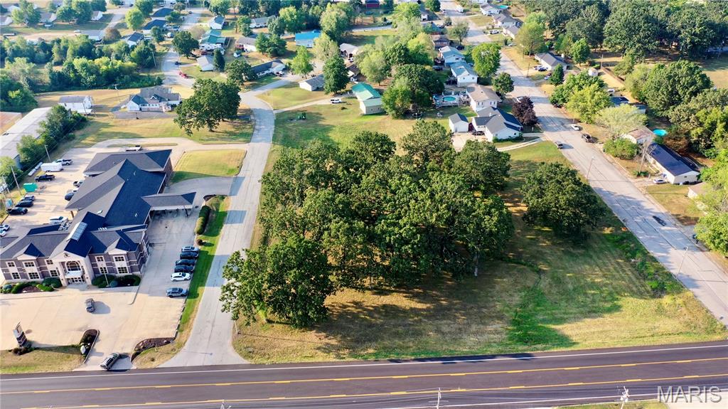 Prime Commercial Development Opportunity in Salem, MO! Located on high-traffic, state-maintained Highway 32 in the heart of Salem, this 3.42-acre surveyed commercial tract offers a rare opportunity to secure a sizable piece of commercial property in a location where large tracts like this are increasingly hard to find. Zoned commercial and offering plenty of room for development, the possibilities are wide open for a shopping center, restaurant, lending facility, office complex, retail business, or a variety of other commercial ventures. With excellent visibility, convenient highway access, and a central Salem location, this property provides the space and location to bring your business or development plans to life. Opportunities to acquire this much commercial land in the heart of Salem are rare—don’t miss your chance to invest in one of the area's hard-to-find large commercial tracts!