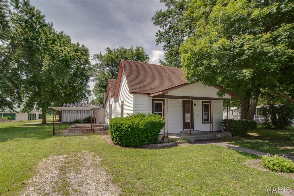 LOTS of transformations have taken place in this 3 bed, 1 bath home: new flooring and paint throughout, new doors, remodeled bathroom, vinyl siding, newer windows. The HVAC is newer, 40 gallon water heater new in October of 2025. The solar panels were installed within the past couple of of years are paid off. You may also enjoy the relaxing comforts of the hot tub. The kitchen is relatively spacious with a center island; generous storage capacity in the cabinets; convenient mud room/laundry/utility area; the 2 car attached garage has plenty of room for vehicles and work space. The home is located within a short distance from local businesses and restaurants. Contact your favorite realtor to schedule a showing.