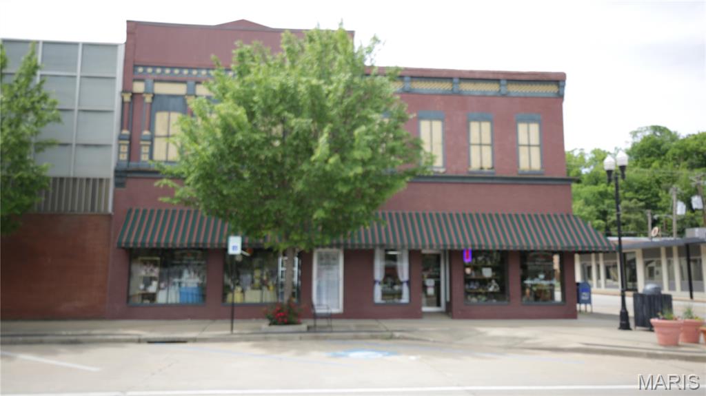 BACK ON MARKET! Please do not approach Seller or anyone during business hours. All appointments must be confirmed. This is an opportunity to own your own business as well as own a part of history! This building has so many uses that could be perfect for you. To start, the existing business is a florist, gift shop, retail store, & sale of branded items. Family owned business. The building offers the opportunity to use one side while renting the other side out with its own store front entrance. Maintenance  has been done to roof, updated some of the electric, HVAC & general maintenance. Well established business. Seller is retiring & ready to help new buyer with the operations. The business is known for it's beautiful arrangements. All inventory is included with the purchase. Main office is large with desk to stay. Work area has great prep space. Seller will go through whole building. Upper level is open with many opportunities, has a section of a glass floor, lift elevator with original pully, History!