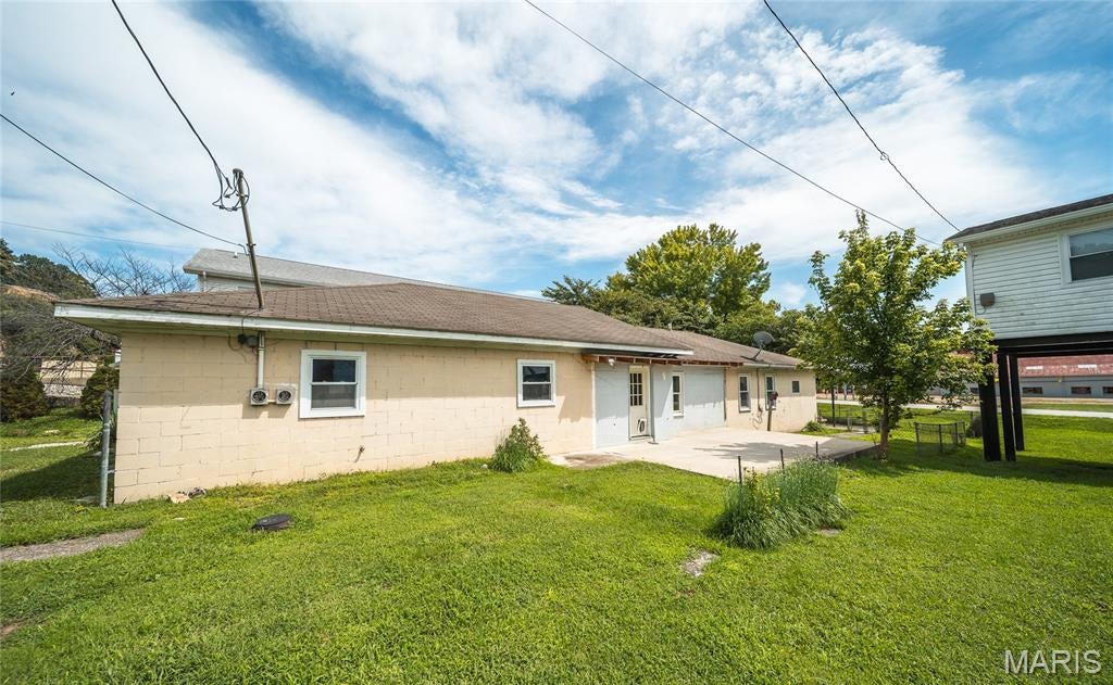 Bring your vision to life in the heart of Grafton.  Located just steps from The Loading Dock and Main Street,  this property offers an incredible opportunity to create something special in one of Illinois' most sought-after river towns. The home has been fully gutted and is ready for your vision to come to life.
being in the floodplain, this residence will have to be built up above the floodline. The positive is the structure is fully concrete block making the build out, that much easier on top of the block foundation. With partial Mississippi River views, off-street parking, and a location within walking distance of Grafton’s restaurants, shops, wineries, and riverfront attractions, the possibilities are endless. Whether you’re looking for an investment property, a short-term rental opportunity, a multi-generational home, or a project to make your own, this property has plenty of potential. Bring your ideas and transform this Grafton great location into something special.