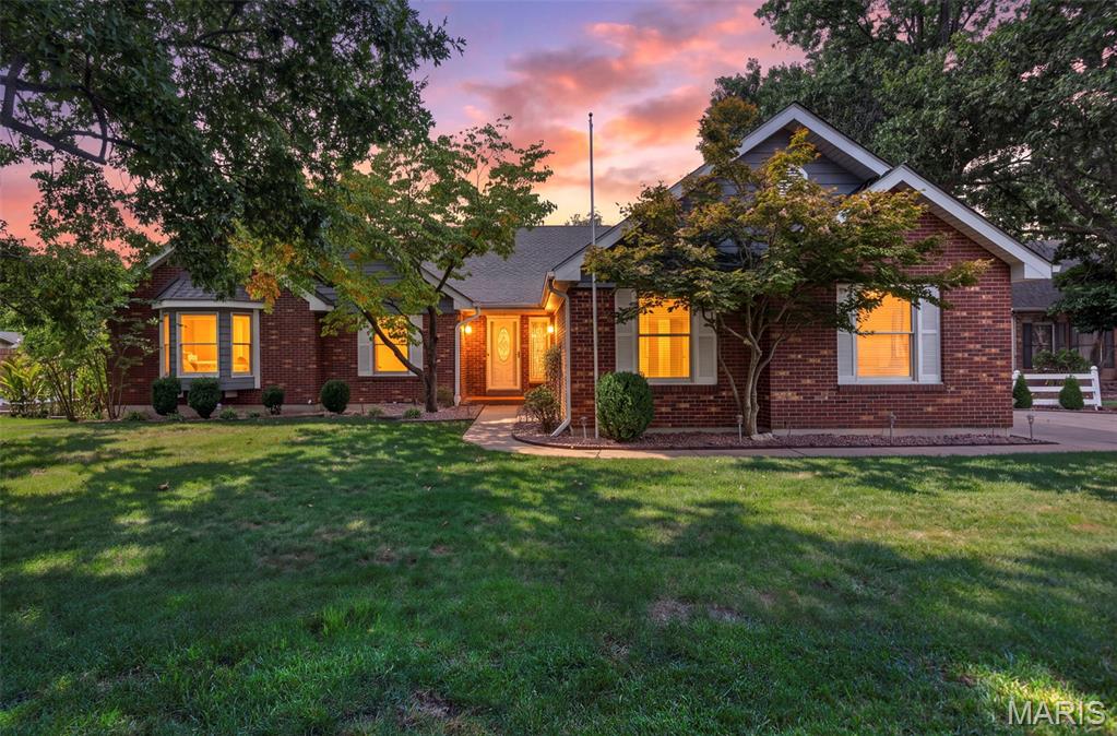 Welcome to this beautiful 3-bedroom, 3-bath ranch in the desirable Old River Estates neighborhood, located in the Francis Howell School District and feeding into Francis Howell North High School. With spacious living areas, two fireplaces, abundant natural light, multiple bay windows, a finished lower level, an impressive 20x17 workshop, and a peaceful backyard setting, this home has so much to offer!

Step inside to a spacious living room featuring vaulted ceilings, recessed lighting, and a cozy gas fireplace. Bay windows throughout the home fill the rooms with natural light and add character at every turn. The kitchen features granite countertops, ceiling-height cabinetry with soft-close doors and drawers, stainless steel appliances, and recessed lighting. Just off the kitchen is a breakfast room with a bay window, while the separate dining room features a tray ceiling and another beautiful bay window. An additional sitting room provides access to the back deck, creating an easy flow for everyday living and entertaining.

The spacious primary suite offers two large windows, private access to the back deck, and double doors leading to an impressive 9x7 walk-in closet with built-in organizers. Step outside and enjoy views of the backyard, where deer, foxes, and other wildlife are known to make an appearance. The primary bathroom features a standalone soaking tub, separate shower, dual vanities with additional center storage, generous mirror space, and recessed lighting. Two additional spacious bedrooms, including one with a bay window, and a full hall bathroom with a linen closet complete the main level bedroom spaces.

The main-floor laundry room leads directly to the side-entry 2-car garage, complete with built-in shelving and an approximately 11x2 bump-out with countertop space for projects, storage, or an additional work area.

Head downstairs and discover even more room to enjoy. The wide-open recreation room offers plenty of space for entertaining and features a wet bar, wood-burning stove, and access to the lower deck and backyard. An additional room provides flexible space for a home office, media room, hobby room, or whatever best fits your needs. The lower level also includes a full bathroom with a standalone shower and additional laundry hookups.

One of the true standouts of the lower level is the incredible 20x17 workshop. Designed with projects in mind, this spacious work area features built-in countertops, abundant shelving and storage, a utility sink, and a higher-amperage electrical outlet for added functionality. Whether you're a woodworker, hobbyist, DIY enthusiast, or simply want an exceptional dedicated workspace, this is a feature you won't find in every home.

From quiet evenings beside one of the home's two fireplaces to entertaining on the decks, tackling your next project in the workshop, or watching wildlife wander through the backyard, this Old River Estates ranch offers a wonderful combination of space, character, and versatility.

Don’t miss your opportunity to see everything this beautiful home has to offer—schedule your showing today!