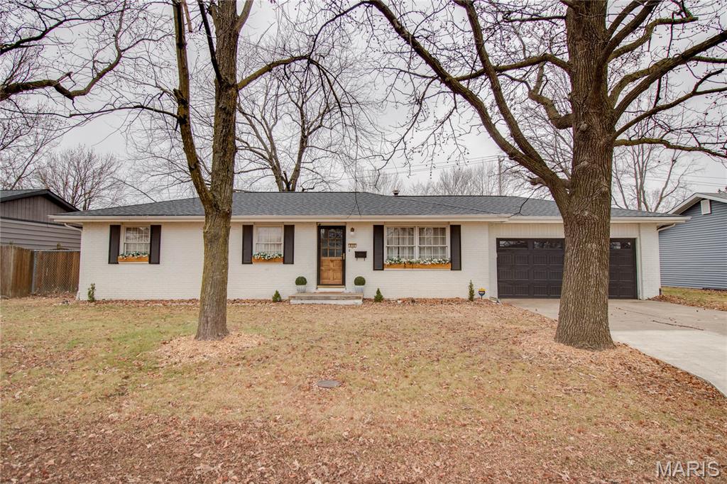 Back on the market at no fault of the seller... Welcome to this recently remodeled 3 bedroom home! The property features a bright living room and a dedicated dining area with access to a deck and patio area. The updated kitchen comes fully equipped with newer refrigerator, dishwasher, electric stove, and microwave.  Three bedrooms with wood flooring, including a primary bedroom with a private bathroom. Exterior features a concrete driveway, an attached two-car garage, and a chain-link fenced yard—perfect for pets or outdoor activities. This home is ready for its next owner to move in and enjoy. Roof, flooring, fixtures, hvac, water heater and more all new within the last 2 years!!
