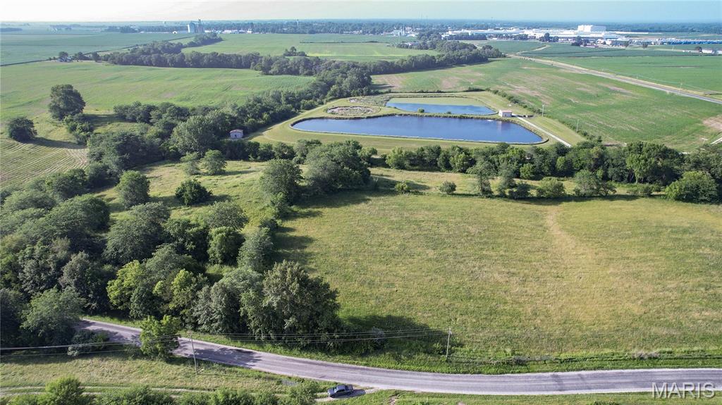 Enjoy the best of both worlds with this beautiful 6.74+/- acre tract offering a blend of tillable ground and natural landscape. A perfect mix of farm ground and scattered trees and open grassy areas, creates an attractive setting for a future homesite, recreational use, or hobby farm.

The combination of open acreage and natural features provides both versatility and privacy, making this a property with endless possibilities. Whether you're looking for room to build, space for outdoor activities, or simply a peaceful country setting, this parcel is worth a look. The property is being divided from a larger tract, and a survey is currently pending. Final acreage and legal description will be determined upon completion of the survey.