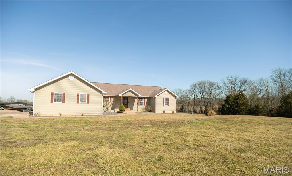 Spacious and beautifully updated home just outside Bloomfield offering over 4,000 sq ft of living space on 20 acres. Built in 2010, this home features an open floor plan with abundant natural light and functional living spaces throughout. The main level includes 3 bedrooms and 2 bathrooms, highlighted by a primary suite with a spa-like bathroom.
The finished basement adds additional bedrooms, a fully equipped indoor gym, and a dedicated movie theater space perfect for entertainment. An energy-efficient geothermal system keeps utility costs low year-round.
Outside, enjoy pasture ground, a pond, and incredible sunset views from the large back deck overlooking the property. This home offers the perfect combination of space, efficiency, and peaceful country living.