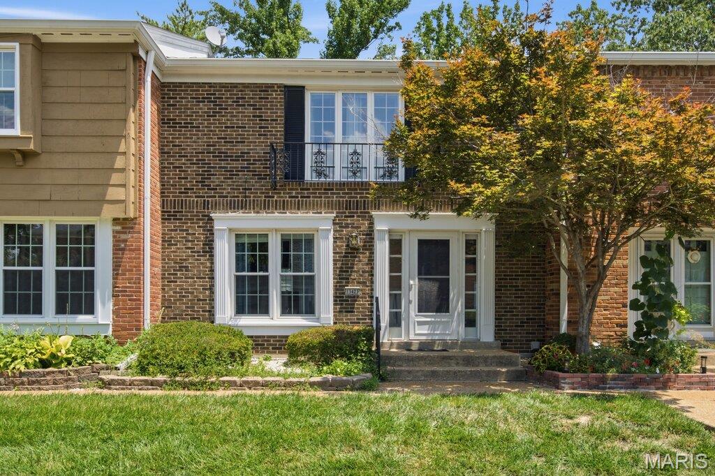 Located in a peaceful, established community just minutes from shopping, dining, and entertainment, this beautifully updated 2-bedroom, 1.5-bath condo offers the perfect combination of comfort, style, and convenience.
Step inside to discover a welcoming sunken living room featuring custom built-in bookshelves, creating a warm and inviting space for relaxing or entertaining. The separate dining area flows seamlessly into the newly renovated kitchen, complete with quartz countertops, custom cabinetry, and a classic subway tile backsplash—perfect for everyday living and hosting guests.
Both bathrooms have been tastefully updated with custom tile work and modern vanities, adding a fresh, contemporary feel. The oversized primary bedroom offers generous space, a large closet, and direct access to the updated full hall bath, creating a comfortable private retreat. A spacious second bedroom provides flexibility for guests, a home office, or additional living needs. The finished walk out lower level expands your living space with endless possibilities for a family room, recreation area, or home office. You'll also find a separate laundry room, additional storage, and convenient access to the attached tuck-under one car garage. Step outside to enjoy your own private patio, ideal for morning coffee or relaxing evenings. Whether you're a first-time homebuyer, looking to downsize, or simply seeking low maintenance living in a fantastic location, this move-in-ready condo is one you won't want to miss. Schedule your private showing today!