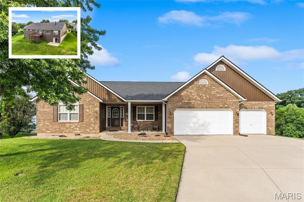 A rare find in O’Fallon: This spacious 4-bedroom walkout ranch delivers over 3,000 sq ft on the main level, an exceptional layout seldom available in the top-rated O’Fallon School District. Perfectly positioned on a quiet cul-de-sac and backing to one of O’Fallon’s hidden local parks, this home offers unmatched privacy, green views, and convenience for buyers seeking proximity to Scott Air Force Base, I-64, shopping, dining, and everyday amenities.

Designed with a highly desirable split-bedroom floor plan, the home features 4 full bathrooms and a massive unfinished walkout basement already equipped with a full bath—ideal for a future 5th bedroom, home theater, gym, workshop, or second family room.

Inside, real bamboo hardwood flooring flows through the main living areas, complemented by durable vinyl in all baths. A welcoming foyer opens to a formal dining room and an oversized family room with vaulted ceilings and a gas fireplace. The open, entertainment-ready kitchen includes stainless steel appliances, a breakfast bar, sunny breakfast nook, and a large walk-in pantry.

A versatile second living space/den sits just off the kitchen and provides direct access to the private primary suite, which includes a generous walk-in closet, double vanity, soaking tub, and separate shower. Three additional guest bedrooms occupy their own wing with convenient access to two full bathrooms.

Everyday functionality shines with a 3-car garage, dedicated laundry room, and practical drop zone. Outside, enjoy an expansive deck overlooking the park, with stairs leading to the backyard and the incredible potential of the walkout lower level.

This home combines location, square footage, privacy, and future expansion potential—a truly rare opportunity in O’Fallon.
