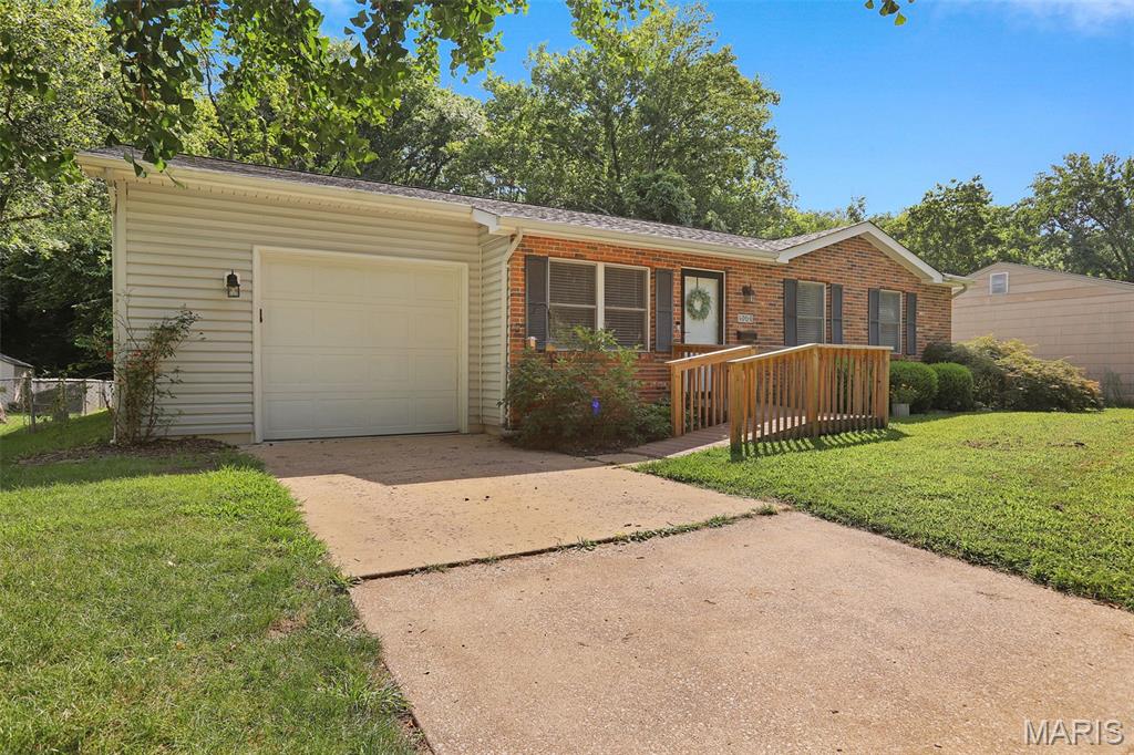 Welcome home to this charming 2 BR/1 BA ranch tucked away in a great neighborhood with convenient access to everything you need!  Step inside to find easy care luxury vinyl plank flooring and a comfortable, functional floor plan.  The eat-in kitchen offers plenty of space for everyday meals and gatherings.  A full basement provides tons of additional storage and plenty of potential for a future recreation room, home gym, workshop or additional living space.  Outside, enjoy the nice fenced backyard, great for pets, gardening, entertaining or simply relaxing.  There is even a chicken coop ready for those dreaming of fresh eggs every morning!  The extended one car garage offers tandem parking for up to two vehicles, along with additional space for storage, lawn equipment or hobbies.  You will love the location close to restaurants, shopping, hospital, parks and beautiful riverfront trails.  Whether you are a first time home buyer, looking to downsize or searching for a great investment property, this one has so much to offer at an affordable price!  Don't miss the chance to make it yours!