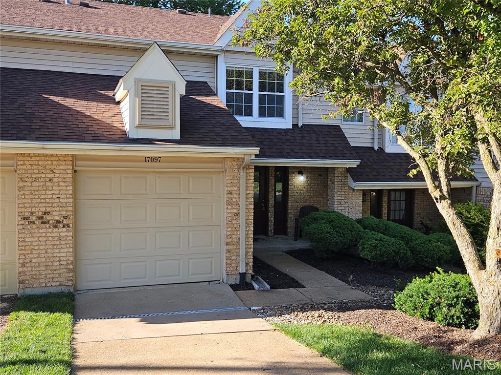 Nicely updated townhouse in a convenient location.  The double height living room features a wood burning fireplace.  The open floor plan
is enhanced by new carpeting and fresh paint. The kitchen offers a generous amount of counter space and plenty of cabinets.  Newer dishwasher,
pantry and a washer / dryer closet complete the kitchen area.  Attached single car garage opens directly into kitchen.  The dining area expands to rear patio via sliding glass door, offering a great place to barbecue and entertain. Primary suite is quite large with a boxed window and double closets.  Updated bath features a new tub/shower, new flooring and double vanities.  Upper level hall overlooks living room and leads to 2nd bedroom/office.  The Sandalwood community features a pool and pool house and expansive common grounds.  Water, trash and sewer and the monthly condo fee are included in the rent.  Occupant would only need to pay for electric and phone/tv/internet.  Great location near walking trails and Wildwood Town Center which offers many amenities.  A minimum credit score of 630 and a minimum monthly income of 3x the rent are required.   Contact listing agent for application link.  Listing agent has an ownership interest in the property.