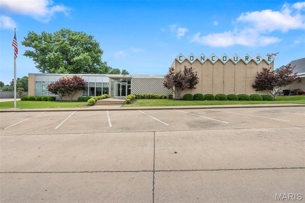 A rare opportunity to own one of the most iconic commercial properties in the area. Originally constructed for the Teamsters in 1962, this striking mid century modern building blends timeless architectural design with the convenience and functionality of a thoroughly modern workspace. Following a masterful renovation in 2015, the property showcases exceptional attention to detail, preserving its architectural character while incorporating high end finishes and advanced technology throughout.

Offering approximately 10,000 square feet on the main level, the building features a versatile layout with multiple private offices, conference rooms, collaborative workspaces, and an executive office complete with a private bathroom. An impressive event and gathering space includes a full bar and projection screen, creating endless possibilities for meetings, presentations, training events, or client entertainment.

Built with durable concrete and steel frame construction, the property also offers four overhead doors, eight indoor parking spaces, and more than 55 exterior parking spaces. The gated rear parking lot features an automatic entry gate for added security and convenience. Whole building smart controls provide seamless management of lighting, climate, security, and building systems.

Architecturally significant, impeccably updated, and designed for both form and function, this is far more than office space. It is a landmark property that makes a statement the moment you arrive.