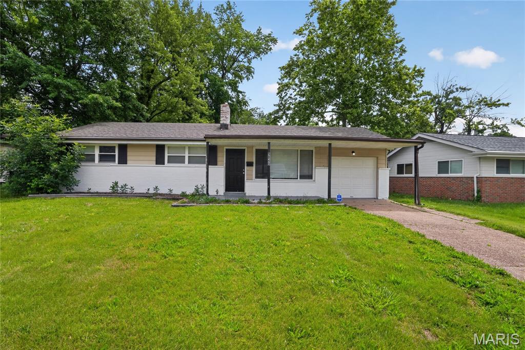 Discover the charm of this classic 3-bedroom, 1-bath brick ranch in the heart of Moline Acres. Located in the established Hathaway Meadows neighborhood, this home offers a solid foundation and a spacious, flat backyard perfect for outdoor gatherings. Inside, you will find a functional, light-filled layout with original hardwood flooring and an efficient design. The full basement provides ample room for storage, a workshop, or future expansion.