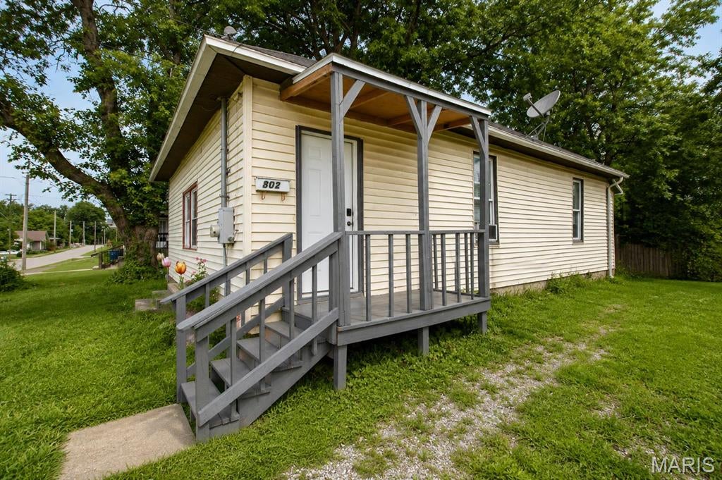 Investors, take a look! This 2-bedroom, 1-bath bungalow offers plenty of potential for your next rental property or flip. The home features generously sized bedrooms, a large enclosed front porch, an additional enclosed back porch, and a partially fenced yard. Whether you're looking to renovate and resell or add another property to your rental portfolio, this could be a great opportunity. The property is being sold AS-IS. Buyer or Buyer's agent to verify all MLS info.