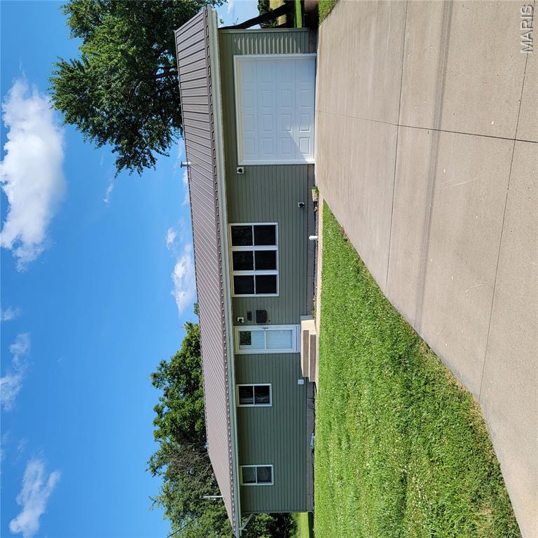 Charming and affordable ranch home in the heart of Owensville, MO, offers approximately 1,040 square feet of comfortable living space and is conveniently located near shopping, parks, and local amenities. The main level features a practical floor plan with three bedrooms, a spacious living area, and plenty of natural light. A full basement provides excellent storage space and potential for a workshop, hobby area, or future expansion. The one-car attached garage adds everyday convenience, while the front and back yards offer room for gardening, outdoor activities, or simply relaxing. With public utilities, central air, forced-air heat, and a durable metal roof, this property is ready for its next owner. Whether you're a first-time homebuyer, looking to downsize, or searching for an investment opportunity, this Owensville home is one you won't want to miss!