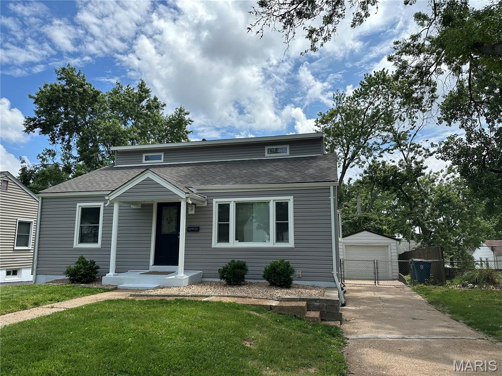 Discover this beautifully updated 4-bedroom, 2-bathroom gem in Overland, Missouri. About 2,000 sq ft of finished living space. The home features a bright, open living space. Kitchen boasts wood cabinets, all new stainless steel appliances: electric range, slim microwave, dishwasher and refrigerator. Separate dining room is perfect for family/guests gathering. Basement is fully finished and is waiting for your decorating/entertainment ideas. Special features: ceramic tile; laminate, vinyl, wood flooring, recessed  lightning, stylish back splash, modern entry door, warm pastel colors.  Enjoy a deck off kitchen and a private, fully fenced  backyard.  Located in a friendly neighborhood, close to schools, parks, and shopping. Brand new roof. Don't forget a garage.   A must-see property!